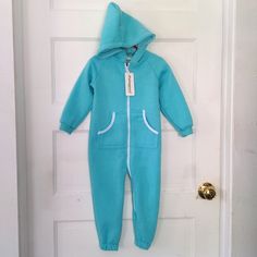 Small Fleece Lined Jumpsuit With Front Pockets And Hood. 30 Inches Long. 12.5 Inch Inseam. About 11 Inch Sleeves. Casual Stretch Onesie For Playwear, Blue Cotton Onesie For Loungewear, Stretch Blue Tracksuit For Winter, Blue Stretch Tracksuit For Winter, Fitted Blue Tracksuit With Pockets, Blue Fitted Tracksuit With Pockets, Blue Cotton Tracksuit For Jogging, Casual Long Sleeve Blue Onesie, Blue Casual Onesie For Playwear