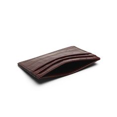 This luxury card holder, made from exquisite Italian cow leather with a crocodile pattern, is a true statement piece. The burgundy color enhances its refined appeal. Specifications: • Material: Italian cow leather with crocodile pattern• Color: Burgundy• Size: 10 x 7.3 cm (3.94 x 2.87 inches)• Structure: 4 credit card slots and one top pocket Elegant Brown Card Holder With Slots, Formal Rectangular Card Holder With Crocodile Pattern, Formal Rectangular Crocodile Pattern Card Holder, Formal Crocodile Pattern Rectangular Card Holder, Elegant Crocodile Pattern Card Holder, Elegant Rectangular Crocodile Pattern Card Holder, Classic Leather Card Holder With Crocodile Pattern, Elegant Brown Card Holder For Formal Occasions, Classic Crocodile Pattern Leather Card Holder