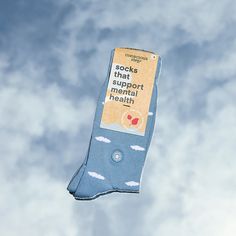 These fluffy blue cloud socks are as cozy as they look, supporting mental health and featuring sunshine embroidery. Fairtrade, GOTS, and Vegan Certified Terry padding for comfort Machine wash cold. Do not Bleach. Tumble dry Low. Do not Iron. 75% Fairtrade Organic Cotton, 23% Recycled Polyester, 2% Elastane Made in India Fit for US Men’s Shoe Sizes: Small (4-8), Medium (8-13), Large (13+) Fit for US Women’s Shoe Sizes: Small (5-9), Medium (9-14), Large (14+) If you’re between sizes, size down for Sunshine Embroidery, Cloud Socks, Floating Clouds, Break The Stigma, Community Outreach, Comfortable Socks, Walking On Clouds, Fits Women, Blue Clouds