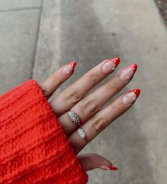 red tips on almond shaped nails with cute pearl details for the holiday season! Red Christmas Nails With Pearls, Red French And Pearls, Red French Tip Nails Almond With Pearls, Summer Red French Nails, Red French With Diamonds, Red Nails With Pearls On Them, Red French Pearl Nails, Red French Tip Nails Pointy, Red French Nails With Pearls