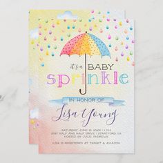 a baby shower with an umbrella and confetti