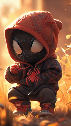 a little spider - man standing in the grass with his hands on his hips and wearing a red hoodie