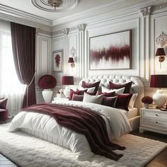 a large white bed sitting in a bedroom next to a window