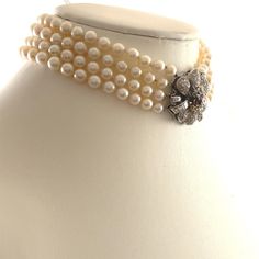 Stunning pearl with floral diamond design choker. Approximately 7.80 carats of color and colorless diamonds. White diamonds approximately G/H color and VS2/SI1 clarity. 18-karat white gold, 12in. *Undetermined whether or not the color diamonds are treated or not  Accommodated with an up-to-date digital appraisal by a GIA G.G. once purchased, upon request. Please contact us with any questions. Pearls Choker, Metal Choker, Chunky Pearls, Contemporary Necklace, Silver Choker Necklace, Crystal Choker Necklace, Colorless Diamond, Pearl Choker Necklace, Silver Choker