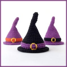 three crocheted witches hats sitting next to each other