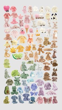 a large collection of stuffed animals sitting next to each other on a white background,