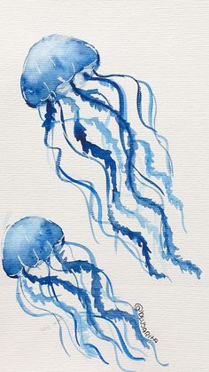 two blue jellyfish in watercolor on white paper