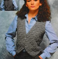 a woman wearing a gray vest and blue shirt