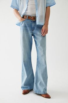 Throwback-style bell bottom jeans in 14oz. BDG denim. Relaxed fit jeans with a slouchy loose leg and wide leg openings. Only at Urban Outfitters. Features BDG Slacker relaxed fit jeans Bell bottom jeans by BDG Mid rise waist 14 oz. denim 5-pocket; zip fly Slouchy & loose fit Flared legs UO exclusive Content + Care 100% Cotton Machine wash Imported Size + Fit Model in Vintage Denim Medium is 6'2" and wearing size 32 Measurements taken from size 32 Rise: 10" Inseam: 33" Leg Opening: 12.5" | BDG Slacker Relaxed Fit Jean in Light Blue, Men's at Urban Outfitters Bottom Jeans, Relaxed Fit Jeans, Bell Bottom, Vintage Denim, Bell Bottoms, Fit Jeans, Jeans Fit, Bell Bottom Jeans, Mid Rise