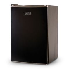 The BLACK+DECKER Energy Star mini fridge has a modern square design that fits - with style - into any indoor living space. Adding convenience to any room for real-life practicality, it is perfectly compact without compromising interior storage space. You'll be amazed by how much it fits. The free-standing, flat back unit fits easily under counters and desks, or in room corners. The adjustable temperature control, can dispenser, removable glass shelves, reversible door, and quiet operation make d Girls College Dorm Room Ideas, Kitchen Hazards, College Dorm Stuff, Dorm Fridge, Cool Mini Fridge, Mini Fridge With Freezer, Can Dispenser, Compact Fridge, Best Refrigerator