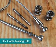 several different types of screws and nails on a wooden surface with the words diy cable ratings kits