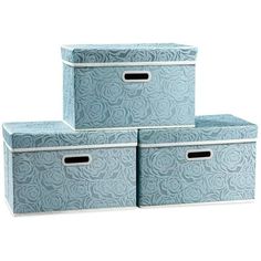 three blue storage boxes sitting next to each other