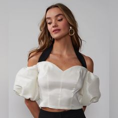 This Gorgeous Halter Top Ties Behind The Neck For A Perfect Fit. It Looks Great With Skirts, Capris, Jeans, Or Dress Pants. It Is Perfect For Your Summer Wardrobe. It Is New With Tag And Size Large. Measurements: 18 Inch Bust And 16.5 Inches At The Waist. Beige Puff Sleeve Top For Party, Elegant Puff Sleeve Crop Top For Party, Fitted Puff Sleeve Tops For Date Night, Spring Evening Crop Top With Puff Sleeves, Chic White Puff Sleeve Top For Party, Chic Evening Crop Top With Puff Sleeves, Elegant Puff Sleeve Crop Top For Night Out, Summer Evening Tops With Puff Sleeves, White Fitted Puff Sleeve Top For Party