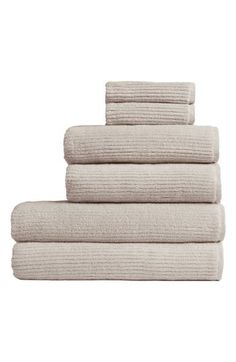 four towels stacked on top of each other