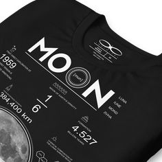 Introducing the Men's Moon And Lunar Data Graphic Tee by Infinite1 Brand. This t-shirt features a stylish graphic design depicting lunar data, perfect for astronomy enthusiasts. Made from high-quality materials, this tee is comfortable and durable for everyday wear. Available in various sizes and in classic black color. Stand out with this unique and trendy t-shirt that showcases your love for the moon and space. Elevate your casual wardrobe with the Men's Moon And Lunar Data Graphic Tee. Men's Moon And Space, Data Graphic, Moon Facts, Lunar Moon, Modern Streetwear, Black Shorts Men, Trendy Tshirts, Fitted Hats, Casual Wardrobe