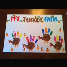 handprinted turkey farm card on a table