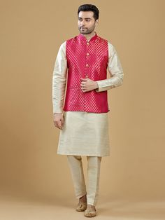 A gold zari brocade vest to pair with any kurta with statement button closures at the front. Occasion: Style this vest with pajama pants and a kurta for a welcome dinner or sangeet night, or style it with a any dress shirt and trousers for a sleek Indian wedding reception look! WASH CARE INSTRUCTIONS - Please Dry clean only. Slight color variation is possible due to digital photography. **Kurta & Pajama not included Festive Pink Nehru Jacket Straight Kurta, Pink Nehru Jacket For Festive Occasions, Pink Nehru Jacket Straight Kurta For Diwali, Pink Nehru Jacket For Diwali, Festive Pink Nehru Jacket With Dabka, Bollywood Style Pink Nehru Jacket For Festive Occasions, Pink Dabka Nehru Jacket For Festive Occasions, Festive Sleeveless Nehru Jacket For Diwali, Sleeveless Bandhgala For Diwali Festive