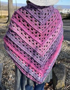 "Pink and purple hues make this shawl really pop. Finished size is 72\" wide and 29\" at longest point. The shawl is in a traditional triangle shawl shape. Perfect to wrap you in a warm hug to ward off the chill in any season. Perfect gift for someone special or for yourself 💕 Hand crochet by me with acrylic yarn. Made in a smoke free and pet free home." Purple Shawl For Fall, Purple Bohemian Shawl For Winter, Purple Bohemian Shawl For Fall, Bohemian Purple Shawl For Fall, Handmade Purple Shawl For Winter, Handmade Purple Winter Shawl, Purple Shawl Scarf For Winter, Purple Winter Shawl Scarf, Purple Triangle