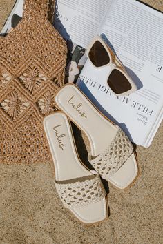 Elevate your everyday adventures with the Lulus Wenda Bone Woven Flat Slide Sandals! Smooth faux leather shapes these perfect summer sandals that have a trendy square footbed and a wide woven vamp strap. The simple slide-on design allows for effortless styling. 0. 5" rubber heel. Lightly cushioned insole. Rubber sole has nonskid markings. Man made materials. Imported. Lulus | Wenda Bone Woven Flat Slide Sandal Heels | Size 10. St Lucia Sandals, How To Tie Shoes, Everyday Sandals, Raffia Sandals, Neutral Shoes, Slides For Women, Nude Shoes, Low Heel Sandals, Woven Raffia