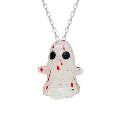 a white necklace with a red and black spooky ghost on it's face