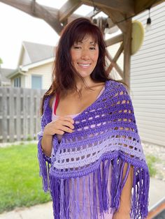 Vibrant purple Ombre Shawl Wrap yourself in elegance with this stunning large shawl, featuring a beautiful purple ombre design and delicate fringe trim. Perfect for any occasion, this versatile shawl can be worn at outdoor concerts, to keep your shoulders warm in chilly rooms, as a cozy lap blanket, or to add a pop of color to your outfit. Ideal for stylish women who love to make a statement all year round. Gift Idea: This shawl makes a thoughtful gift for anyone who adores purple and appreciate One Size Bohemian Purple Poncho, Purple Bohemian Scarf, One Size, Bohemian Purple Scarf One Size, Purple Bohemian Scarf One Size, One Size Bohemian Purple Scarf, One Size Purple Bohemian Scarf, Purple Festival Shawl, Purple Festival Scarves, Boho Shawl