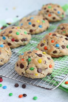 chocolate chip cookies on a cooling rack with colorful candy