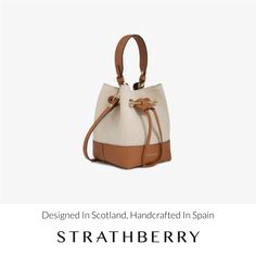 A modern take on the classic bucket bag, our best-selling osette is your perfect everyday companion. Deceptively spacious, the soft structure is handcrafted in spain from buttery-soft pebble finished leather and features an elegant drawstring closure, complete with our signature music bar. This compact yet versatile silhouette can be carried in hand by the leather top-handle, or styled as a crossbody bag with the detachable leather strap. Experience the relaxed charm of canvas, as our best-selling lana osette is re-imagined for the season. Pairing our signature grain leather with a two-tone canvas produced in italy, this relaxed style perfectly encapsulates the magic of ibiza and a summer of endless possibilities. Natural Bucket Bag With Detachable Strap, Everyday Natural Bucket Bag With Detachable Strap, Luxury Hobo Bag With Leather Handles For Everyday, Everyday Bucket Bag, Versatile Beige Bucket Bag, Modern Natural Bucket Bag With Adjustable Strap, Everyday Bucket Shoulder Bag With Leather Handles, Chic Natural Leather Bucket Bag, Beige Crossbody Bucket Bag For Everyday