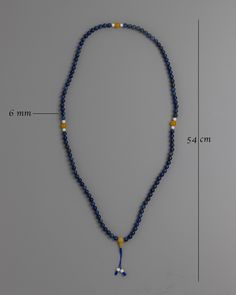 3A Quality Lapis Mala About our Mala Beads Originating in India, the 3A Quality Lapis Mala is a testament to both spiritual significance and expert craftsmanship. The 6mm lapis lazuli beads used in each carefully made mala are prized for their deep blue hue and special qualities. Enhanced with conch and yellow jade dividers, the mala is a symbol of spiritual awakening and prosperity in addition to elegance.The 3A Quality Lapis Mala is a tactile and visual journey towards inner serenity and self- Dharma Wheel, Rituals Set, Yellow Jade, Maitreya Buddha, Lapis Lazuli Beads, Green Tara, Wheel Of Life, Mala Beads, Conch