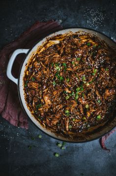 a large pot filled with food on top of a table