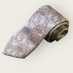 Treat yourself with a new pattern and splash of color to your look with this unique tie set. 100% Silk Handmade Package Includes: Tie, Pocket Square & Cufflinks. Length: 59" Width: 3.34" Warm iron if needed Formal Patterned Paisley Suit And Tie Accessories, Formal Multicolor Paisley Suit And Tie Accessories, Multicolor Adjustable Tie For Formal Occasions, Elegant Multicolor Ties For Father's Day, Elegant Paisley Print Suit And Tie Accessories For Gift, Elegant Paisley Print Tie As A Gift, Elegant Paisley Print Ties As Gift, Unique Ties, Cufflink Set