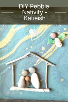 a nativity scene made out of rocks and pebbles with text overlay that reads diy pebble nativity - katelish