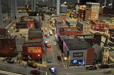 a model city with lots of buildings and cars