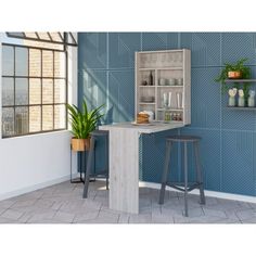 an image of a kitchen setting with blue tiles on the wall and two stools