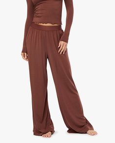 Wide Leg Pant Versatile Wide Leg Elastane Pants For Loungewear, Effortless High-waisted Loungewear Bottoms, Effortless High-waisted Loungewear Pants, Effortless High-waisted Lounge Pants, Chic Elastane Sweatpants For Loungewear, Effortless Wide Leg Loungewear Bottoms, Spring Wide Leg Elastane Pants For Loungewear, Versatile Wide Leg Pants With 4-way Stretch For Fall, Versatile Stretch Viscose Pants