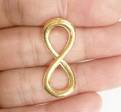 6 pcs of gold plated infinity pendant 31x13mm Gold Infinity Shaped Metal Jewelry, Infinity Pendant, Base Metal, Zinc Alloy, Infinity Bracelet, Gold Color, Gold Plate, Plating, Craft Supplies