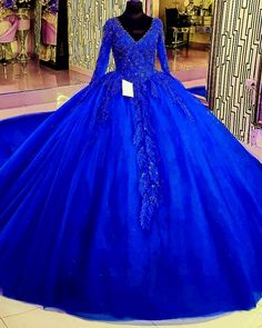 Royal Blue Ball Gown For Quinceanera During Prom Season, Long Sleeve Ball Gown For Quinceanera And Prom Season, Long Sleeve Ball Gown With Fitted Bodice For Quinceanera, Long Sleeve Fitted Bodice Ball Gown For Quinceanera, Formal Tulle Quinceanera Ball Gown Dress, Formal Tulle Quinceanera Ball Gown, Formal Quinceanera Tulle Ball Gown, Royal Blue Royal Ball Gown For Quinceanera, Royal Fitted Ball Gown For Quinceanera