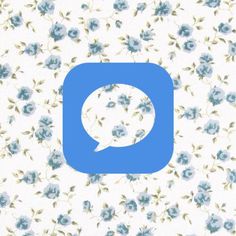 a blue flowered wallpaper with the letter q on it's left side