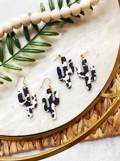 Black And White Cow Print, Boho Cactus, Cowhide Fabric, White Cow Print, Soap Gifts, Black And White Cow, Diy Crafts For Teens, Faux Cowhide, Cactus Earrings