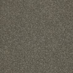 a close up view of an asphalt surface with small dots in the middle and dark gray colors