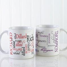 two white coffee mugs with different types of words on them sitting next to each other