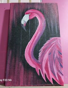 a painting of a pink flamingo on a black and purple background with white trim