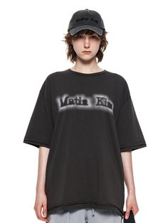 This is a trendy and casual t-shirt by MATIN KIM that is made out of high quality and sturdy fabric. With unique design detail and trendy mood, you can style it for your casual and young daily outfit.- Cotton blend fabric with high elasticity- Casual logo detail- Relaxed oversized silhouette Urban Style Washed Black Top With Text Print, Urban Washed Black Top With Text Print, Urban Washed Black Tops With Graphic Design, Washed Black Cotton Top With Text Print, Summer Washed Black Graphic Top, Washed Black Graffiti Print Top For Streetwear, Trendy Washed Black T-shirt With Text Print, Washed Black Cotton T-shirt With Graffiti Print, Washed Black Graffiti Print T-shirt For Summer