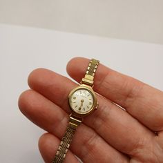 Vintage 9ct GOLD VESTA Ladies Windup Watch 1964 Swiss 17 Jewel Incabloc Working Well. Good condition, working 9ct Gold windup. A great looking watch! Swiss made, 9ct gold case / beautiful clean face and gold-tone band 16.5cm wrist. Comes with the ORIGINAL receipt, was bought in London 16-5-1964, from assistant No.8 the price was 9 pounds 19 shillings and 6 pence! PLEASE NOTE! Very old watches and clocks, especially the wind-up mechanical type, are notoriously unreliable and temperamental. Althou Vintage Gold Watch, Old Watch, Old Watches, Style Watch, Clock Hands, Clean Face, No 8, Gold Case, Women Wrist Watch