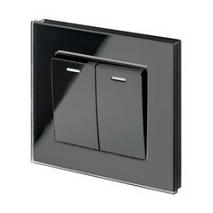 a black and silver light switch on a white background