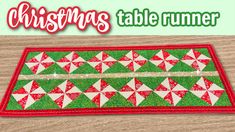 a christmas table runner is shown with the words christmas table runner in red and green