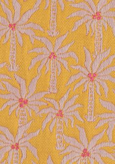 a yellow and pink fabric with palm trees on it