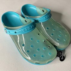 Crocs Unisex Classic Translucent Clog W7/M5 Digital Aqua 206908-4sl Blue Slip-resistant Synthetic Clogs, Casual Jelly Sandals With Translucent Outsole, Casual Slip-on Jelly Sandals With Translucent Outsole, Casual Translucent Jelly Sandals, Slip-on, Casual Translucent Slip-on Jelly Sandals, Blue Closed Toe Jelly Sandals, Blue Closed Toe Jelly Sandals Casual, Blue Slip-resistant Closed Toe Clogs, Blue Non-slip Casual Jelly Sandals