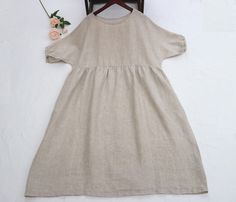 "[Feature] -Material: 100%Linen -Washing in cold water -Have a pocket In order to make it more suitable for you, please tell me your body measurements. -your height -your weight -your bust circumference -your upper Arm circumference -Phone number for shipping  XS: Bust:88cm/34.5\" waist: 84cm/33\" length:105cm/41.5\" S: Bust:92cm/36\" waist: 88cm/34.5\" length:105cm/41.5\" M: Bust:96cm/38\" waist: 92cm/36\" length:105cm/41.5\" L: Bust:102cm/40\" waist: 98cm/38.5\" length:105cm/41.5\" XL: Bust:10 Casual Solid Color Dresses With 3/4 Sleeves, Casual 3/4 Sleeve Solid Color Dress, Casual Solid Color Dress With 3/4 Sleeves, Casual Solid Color 3/4 Sleeve Dress, Casual Half Sleeve Solid Color Dress, Summer Dresses With 3/4 Sleeves In Solid Color, Solid Color Summer Dresses With 3/4 Sleeves, Solid Color Half Sleeve Dress For Beach, Casual Solid Color Midi Dress With Half Sleeves