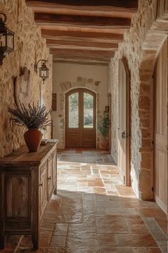 Timeless Mediterranean hallway design with plush red runner wrought iron chandelier gold accents Venetian mirror arched doorways and warm terracotta walls Italian Hallway, Mediterranean Hallway, Christmas Nails Simple Classy, Italian Villa Interior Design, Country Hallway, Christmas Nails Simple, Antique Sconces, Terracotta Walls