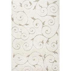 a white rug with an intricate design on it